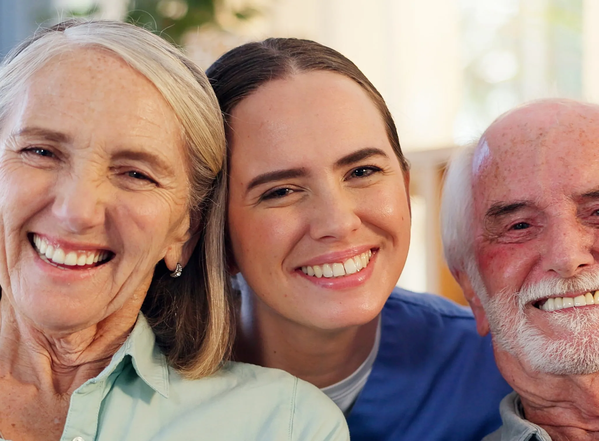 a family taking a family picture of everyone laughing.