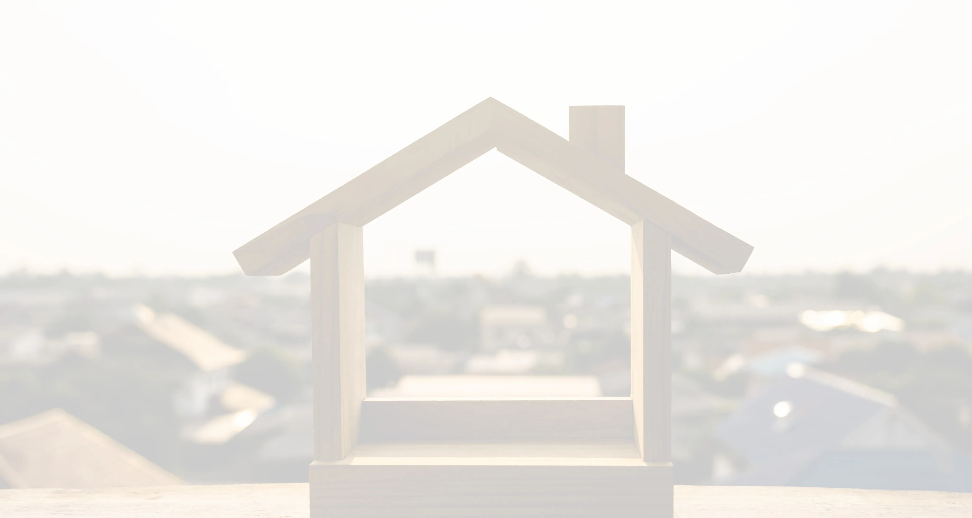 A picture of a little wooden house model